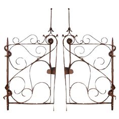 pair of wrought iron gates on white background