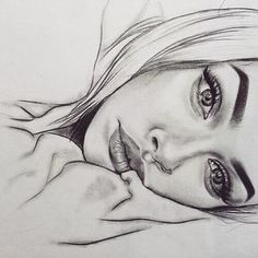 a pencil drawing of a woman's face