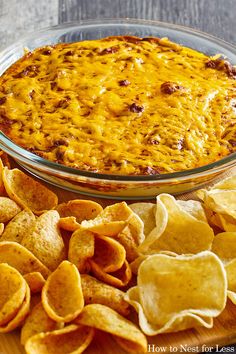 a casserole dish with cheese and tortilla chips