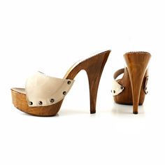 clogs with beige patent leather, heel 13 cm + plateau 4 cm. Completely handmade in Italy. Craftsman-made. The Latest KIARA SHOES collection Online for better price ever and new styles for women. 35 EU = 4 US = UK3.5 = 23.00 CM 36 EU = 5 US = UK 4 = 23.50 CM 37 EU = 6 US = UK 5 = 24.00 CM 38 EU = 7 US = UK5.5 = 24.50 CM 39 EU = 8 US = UK 6 = 25.00 CM 40 EU = 9 US = UK6.5 = 25.50 CM 41 EU = 10US = UK7.5 = 26.00 CM 42 EU = 11US = UK 8 = 26.50 CM Platform Clogs Shoes, High Heel Sandals Platform, Wooden Heels, High Heel Mules, Clog Heels, Aesthetic Shoes, Shoes Collection, Wooden Heel, Leather Clogs