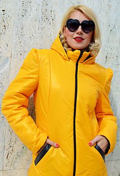 Long coat, a puffer jacket with hood, warm, playful and comfortable. Padded yellow and black coat with zipper closure and adjustments. Black and orange winter coat, outstanding and daring that will steal the spotlight! Double face winter jacket. Material: slicker 100% poliester Care instructions: Dry clean only The model in the picture is size S. Can be made in ALL SIZES. If you have any other specific requirements, do not hesitate to contact me! I DO NOT CHARGE EXTRA MONEY for custom made items Winter Solid Color Hooded Puffer Jacket, Hooded Puffer Outerwear For Winter, Trendy Puffer Hooded Jacket For Cold Weather, Winter Hooded Puffer Parka, Solid Color Hooded Puffer Jacket For Winter, Hooded Puffer Jacket With Drawstring For Cold Weather, Quilted Hooded Outerwear For Fall, Trendy Winter Puffer Jacket With Double-lined Hood, Trendy Hooded Puffer Jacket For Winter