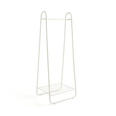 a white metal rack with two hooks on it