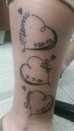 a tattoo on the leg of a woman with two hearts