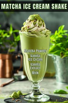 matcha ice cream shake in a glass with whipped cream and toppings on top