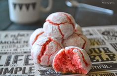 some red velvet cookies sitting on top of a newspaper