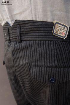 Made in British wool. Loose fit chino with straight leg and high rise. Features zip fly with a buttoned closure, front angled pockets, a right hip coin pocket and two back buttoned pockets. Made in Italy Brand: Scarti-Lab Size 30: waist 32", inseam: 30 1/2", bottom opening: 17" Size 32: waist 34", inseam: 30 1/2", bottom opening: 18" Size 34: waist 36", inseam: 31", bottom opening: 19" Size 36: waist 38", inseam: 31", bottom opening: 20"