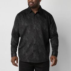 This Shaquille O'Neal XLG men's long-sleeve shirt from the brand's big and tall collection is perfect for a dressy occasion. It's cut for a classic-fit from stretch-cotton with a sateen finish and has a point collar and long cuffed sleeves. Wear it with pants and a coat. Closure Type: ButtonFit: Classic FitSleeve Length: Long SleeveSleeve Style: Cuffed SleeveFiber Content: 57% Cotton, 40% Polyester, 3% SpandexFabric Description: SatinCollar: Point CollarCare: Tumble Dry, Machine WashCountry of O Shaquille O'neal, Large Shirts, Button Front Shirt, Big And Tall, Cuff Sleeves, Stretch Cotton, Mens Long Sleeve, Black Shirt, Shirts Tops