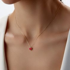 The heart-shaped necklace is red in color. The outside of the heart is surrounded by gold. In the upper-middle part of the heart, there is a ring that connects the pendant to the chain. Preppy Heart Necklace, Dainty Necklace, Anniversary Gift, Bridal Shower, 14K Gold Necklace, Gifts For Her, Bridesmaid Gifts, Heart Pendant, Heart Charm, Tiny Heart Pendant, Solid Gold Heart All of our products has the stamp "585" on them. (which states that this is real gold) Gold heart necklace 1.62 gr and the chain length is 46 cm. There may be +/- 0.15 change in gram information due to production. Your products will be shipped with free shipping UPS express within 1-3 business days. Quality control has been done. Gold heart pendant is Anti Allergic. Minimalist Elegance: The heart, a universal symbol of l Preppy Heart, Red Heart Necklace, Parts Of The Heart, Evil Eye Necklace Gold, Necklace Stand, Pendant Heart, Gold Armband, Heart Shaped Necklace, Heart Pendant Gold