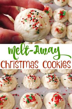 christmas cookies with sprinkles and frosting are on a baking sheet to be eaten