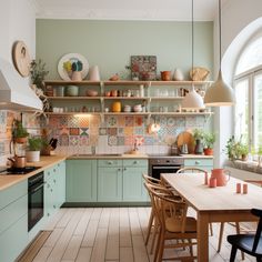 a kitchen filled with lots of counter top space and wooden furniture next to a window