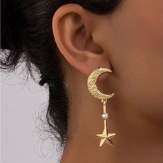 “Shooting Star Crescent Moon” Ornate Elaborate Textured Pearl Celestial Cosmos Universe Sky Astronomy Astrology Galaxy Elegant Upscale Gold Stud Post Dangle Earrings. Beautiful Gold Ornate Abstract Floral Textured Crescent Moon With A Three-Dimensional “Shooting Star” Dangling Beneath, It’s Trail Interrupted By A Central White Pearl. So Lovely! 925 Sterling Silver Posts. Hypoallergenic. Lead & Nickel Free. New. *Also Available In Bronze! Measurements: Eardrop Length: 2.1” Earring Width: 0.7” If Gold Moon-shaped Earrings For Party, Gold Moon Shaped Earrings For Party, Gold Moon-shaped Party Earrings, Celestial Earrings, Eid Ramadan, Aqua Beads, Silver Statement Earrings, Earrings Trendy, Opal Studs