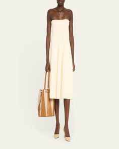 Altuzarra "Drum" bucket bag in canvas cotton and leather     Shoulder strap    Drawstring closure     Approx. 9.5"H x 13"W x 9.5"D    Made in Spain Beige Bucket Bag For Summer Evenings, Beige Bucket Bag For Evening In Spring, Beige Bucket Bag For Spring Evening, Beige Evening Bucket Bag For Spring, Leather Bucket Bag, Leather Bucket, Large Canvas, Bergdorf Goodman, Canvas Leather