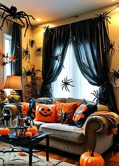 a living room decorated for halloween with spider decorations