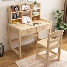 a wooden desk and chair in a room