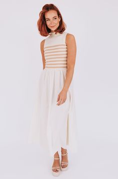 Get ready to set sail in style with our Sail Away With Me Dress! Featuring a ribbed knit bodice for comfort and a high neckline for a chic look. The contrasting fabrics add an extra touch of flair to this must-have dress. Perfect for any occasion, this dress will have you feeling confident and ready to conquer the day! Details Ribbed knit bodice High neckline Contrasting fabrics Sizing Approximate measurements: SIZE LENGTH BUST Small 53"﻿ 28"﻿ Medium 54"﻿ 30"﻿ Large 54"﻿ 32"﻿ Fabric has stretch Spring Ribbed Turtleneck Dress, Chic Beige Turtleneck Dress, Sleeveless Striped Hem Dress, Sleeveless Dresses With Striped Hem, Chic High Neck Ribbed Dress, Chic Beige Ribbed Dresses, Chic Sleeveless Dress With Striped Hem, Chic High Neck Midi Dress For Daywear, Summer High Neck Beige Dress