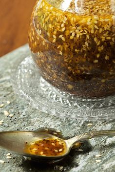 a jar filled with food sitting on top of a table