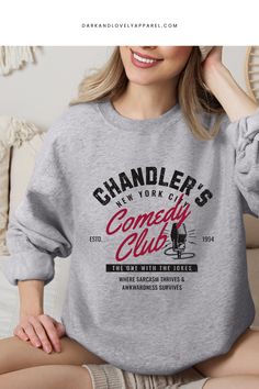 Channel your favorite character Chandler with our exclusive Chandler's Comedy Club sweatshirt! This graphic sweatshirt, inspired by the iconic TV show Friends, will bring 90's nostalgia and sarcasm to your outfit, making it the perfect addition to your retro, vintage, or casual fashion wardrobe. Don't miss out on the chance to own this one-of-a-kind piece! Trendy Graphic Tees