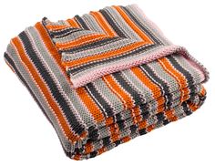 an orange and grey blanket folded on top of each other