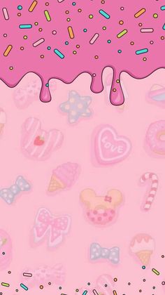 a pink background with lots of candy and candies