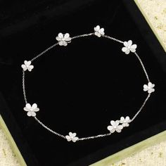 FRIVOLE SILVER 9 FLOWERS NECKLACE Delicate White Sterling Silver Flower Necklace, Luxury Silver Elegant Flower Necklace, Luxury Silver Flower Necklace, Silver Flower-shaped Necklace For Her, Luxury Silver Flower-shaped Necklace, Trinity Bracelet, Detailed Jewelry, Stunning Necklace, Love Necklace