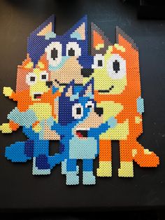 an image of some type of artwork made out of legos that look like cartoon characters