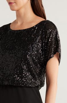 Twinkling sequins shimmer like evening stars on this event-ready dress completed by a solid skirt. 42 1/2" length Slips on over head Boat neck Short sleeves Partially lined 97% polyester, 3% spandex Hand wash, dry flat Imported Holiday Evening Sequin Dress, Sparkling Sequin Dress For Evening, Holiday Evening Sequin Glitter Dress, Elegant Sequin Fabric For Holiday Party, Elegant Contrast Sequin Fabric For Holiday Party, Elegant Holiday Party Contrast Sequin Fabric, Holiday Formal Sequin Dress With Glitter, Elegant Shiny Sequin Dress For Holiday, Formal Holiday Sequin Glitter Dress