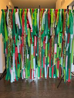 a bunch of streamers that are hanging on a wall