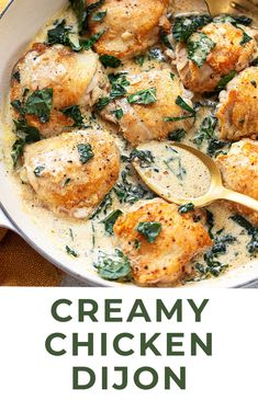 creamy dijon chicken with spinach and cheese in a skillet