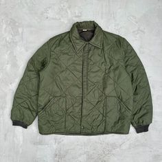 Vintage Military Collared Puffer Quilted Jacket With Cuffs And Simco Zipper Closure Good Condition, Stitching Coming Undone In Some Parts But Fixable. Some Staining Throughout. Size Xl 25.5x28 Shop Policies: No Refunds / Returns / Exchanges / Trades. Vintage And Used Items May Have Wear Including But Not Limited To Yellowing, Staining, Pilling, Holes, Etc. We Will Do Our Best To Disclose But Some Imperfections May Be Missed. Items Typically Shipped Same Or Next Day. Measurements Are Included For Solid Winter Outerwear With Button Cuffs, Winter Outerwear With Button Cuffs In Solid Color, Winter Outerwear With Button Cuffs, Long Sleeve Outerwear For Cold Weather, Winter Outerwear With Button Cuffs For Cold Weather, Military Style Long Sleeve Winter Outerwear, Classic Quilted Jacket For Winter Outdoor, Green Long Sleeve Outerwear With Button Cuffs, Khaki Long Sleeve Quilted Jacket For Work