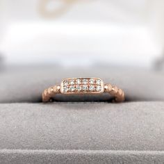 A beautiful diamond ring in 14k solid gold that can sit with your ring perfectly, or be worn on its own! 14k Rose Gold Stackable Diamond Cut Rings, Fine Jewelry Diamond Stackable Rings In Rose Gold, Minimalist Diamond Ring With Pave Setting For Gift, Minimalist Diamond Ring With Pave Setting As Gift, Rose Gold Diamond Stackable Rings Fine Jewelry, Rose Gold Sterling Silver Diamond Ring With Single Diamond, Fine Jewelry Rose Gold Diamond Stackable Rings, Minimalist Diamond Ring With Pave Setting, Dainty Rose Gold Diamond Ring