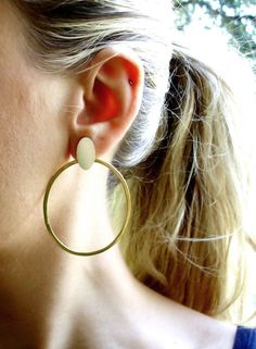 Sterling Silver and Brass Oval Boho Hoops, lightweight and elegant. - The top oval part is hand cut from sterling silver sheet, and the hoop is made out of 2mm hammered brass wire. - Sterling silver posts and butterfly stoppers. - The earrings measure 6cm (2.4 inches) long by 4.5cm (1.8 inch) wide. - Bright matte finish. These earrings are made to order and will be shipped within 6-8 business days from purchase. They will arrive securely gift wrapped via registered airmail. Feel free to contact Front Back Earrings, Brass Hoop Earrings, Statement Hoop Earrings, Brass Hoops, Large Hoop Earrings, Earrings Minimalist, Silver Bars, Bar Earrings, Earrings Statement