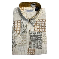 Men’s Damon Short Sleeve Button Down Shirt 55% Linen/45% Cotton Neutral Colors. Background Color Is Cream And The Pattern Is A Bit Geometric With Different Grids, Lines And Squares. Pattern Colors Are A Dark Sage Green, Golden Tans, And Golden Browns. Size Is 1xl/ Big Brand New With Tags Neutral Colors Background, Retro Beige Shirt With Button Closure, Casual Beige Button-up Camp Shirt, Fall Button-up Shirt With Abstract Print, Retro Beige Button-up Shirt, Patterned Graphic Print Button-up Camp Shirt, Patterned Printed Button-up Camp Shirt, Dark Sage Green, Cotton Button-up Shirt With Geometric Pattern