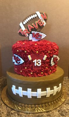 a football themed cake with red and white decorations