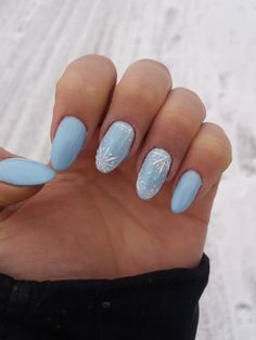 Light Blue Nails With Design Winter, Powder Blue Winter Nails, Short Almond Nails Ideas Winter, Snow Nails Almond, Winter Nails Almond Shape Blue, Blue Winter Gel Nails, Light Blue Winter Nails Acrylic, Winter Nails Light Blue, Light Blue Nails Winter