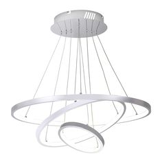 a white circular light fixture with three lights hanging from it's center and two circles on the bottom