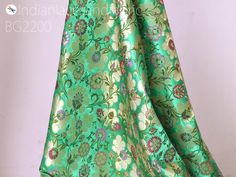 Sea Green Silk Brocade Fabric By The Yard Banarasi Indian Bridal Wedding Dresses DIY Crafting Sewing Costume Lehenga Blouses Home Decor. This is a beautiful multi color banarasi pure silk brocade in floral design fabric in multi color (Sea Green with Peach, Lavender, Magenta, Olive Green) and Gold. ➤Product : Brocade Fabric ➤Fabric Type: Blended Silk (Viscose + Rayon and 30% Silk) Fine Quality Zari Brocade Weaving from Banaras ➤Color: Base color is (Sea Green with Peach, Lavender, Magenta, Olive Wedding Dress With Pallu In Brocade, Fitted Green Banarasi Silk Dress, Festive Green Brocade Dress, Brocade Dress With Pallu For Traditional Ceremonies, Green Brocade Dress For Wedding, Green Brocade Wedding Dress, Silk Wedding Dresses With Motifs, Green Brocade Dress With Dupatta, Green Brocade Dress For Festivals