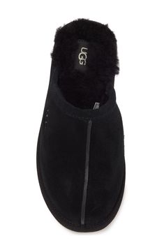 Slide into comfort with a faux fur lined slipper with clasic Ugg style. Round toe Slip-on Faux fur lining Leather upper, faux fur (80% wool, 20% lyocell) lining, manmade sole Imported Casual Sheepskin Slippers With Suede Lining, Casual Sheepskin Indoor Slippers, Casual Sheepskin Slippers For Fall, Casual Indoor Sheepskin Slippers, Casual Shearling Slippers For Fall, Casual Sheepskin Slippers With Plush Lining, Casual Shearling Slippers For Indoor, Casual Indoor Shearling Slippers, Black Casual Slippers With Faux Fur Lining