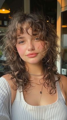 Unique Haircuts For Curly Hair, Subtle Bangs Curly Hair, Naturally Curly Hair Bangs, Face Framing Curly Bangs, Bangs In Curly Hair, Fun Curly Haircut, Curly Hair Cuts Bangs, Bangs Heart Shaped Face, Curly Hair Wispy Bangs