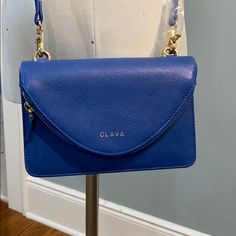 Soft Supple Blue Leather Crossbody Bag From Clava. Wallet On One Side And Pouch On The Other. Can Be Worn Together As Shown Or Individually. Blue Travel Clutch With Detachable Strap, Blue Clutch With Detachable Strap For Travel, Blue Travel Clutch With Mobile Phone Bag, Blue Leather Crossbody Clutch, Blue Crossbody Clutch With Removable Pouch, Blue Clutch With Mobile Phone Bag For Daily Use, Blue Clutch With Detachable Strap For Daily Use, Travel Blue Clutch, Blue Crossbody Clutch For Travel