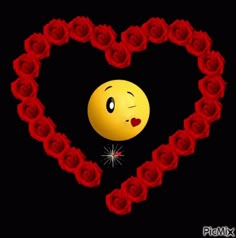 a heart with roses in the shape of a smiley face and an emoticive expression