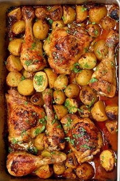 chicken, potatoes and parsley in a roasting pan