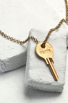 Embrace your word, then Pay It Forward to a person you feel needs the message more than you. Then write us a story of why you gave it away. Hand stamped and assembled in Downtown Los Angeles by people transitioning out of homelessness 27" chain, finished with a lobster clasp Many of our keys are repurposed and may not look like the keys pictured Customize your word by typing into the custom field above Giving Keys, Key Jewelry, Classic Necklace, Key Necklace, Gifts For Your Mom, I Love Jewelry, Ball Chain, Antique Gold, Hand Stamped