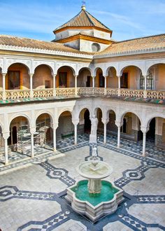 the courtyard of an old spanish style house