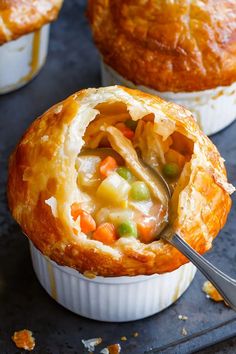 a close up of a pie with a spoon in it