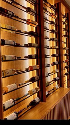 a wine cellar filled with lots of bottles