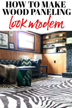 a living room with zebra print rug and wooden paneling