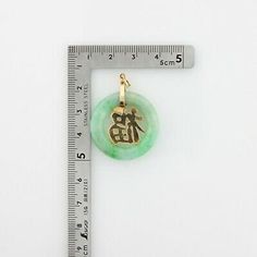 "Vintage 14K Green Jadeite Pi Stone Pendant, 1 1/8\" across, 3/16\" swing bail, Chinese calligraphy in gold, Circa 1960, 9.1 grams Stock # BB249P13 This listing contains photographs of the actual item you will receive. Our items are in excellent condition with little or no signs of wear and many are one of a kind pre-owned estate finds. Please look closely at the pictures in this listing as they are part of the product description. Please read the description, as any imperfections or condition c Chinese Calligraphy, Fine Jewelry Designers, Blue Topaz Ring, Topaz Ring, Stone Pendants, Blue Topaz, Gold Diamond, Vintage Jewelry, Im Not Perfect