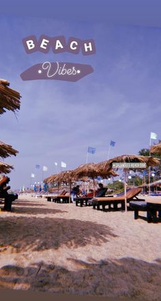 there are many umbrellas on the beach with words above them that read, beach vibes