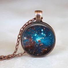 This Pendant Necklaces item by PearlysPoshPendants has 493 favorites from Etsy shoppers. Ships from Ramseur, NC. Listed on Nov 7, 2023 Astronomy Necklace, Nebula Necklace, Ethereal Blue, Constellation Jewelry, Saturn Necklace, Galaxy Jewelry, Galaxy Necklace, Space Universe, Space Jewelry