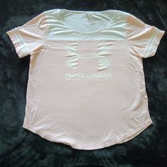 Size Large Ladies Under Armour Shirt. Tags Were Removed But Never Worn. In Excellent Condition. Light Weight. Would Be A Good Work Out Shirt. Light Pink And White In Color. Casual Pink Under Armour Top, Under Armour Cotton Summer Tops, Summer Cotton Tops By Under Armour, Under Armour Sporty Summer Tops, Shirt Tags, Under Armour Shirt, Yoga Activewear, Rock T Shirts, Loose Fitting Tops